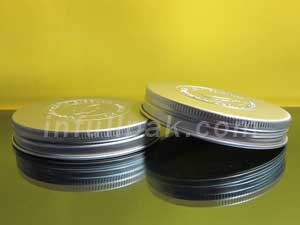 Aluminum lid with logo embosse